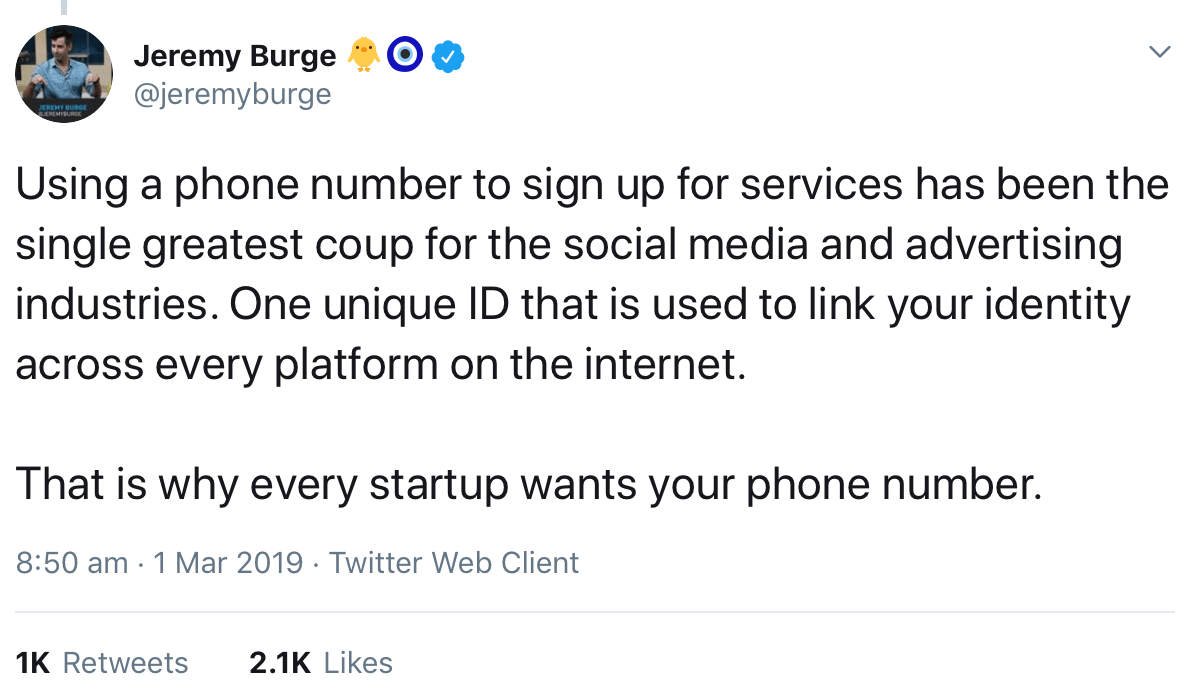 A tweet from @jeremyburge highlighting how phone numbers are being used as a unique ID to link user's identities across every platform on the internet.