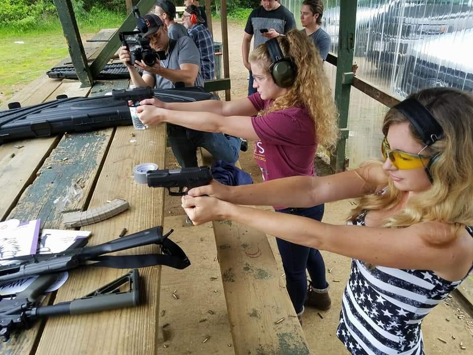 Liberty Hangout Media Director Kaitlin Bennett and Infowars reporter Millie Weaver shooting firearms at a gun range.