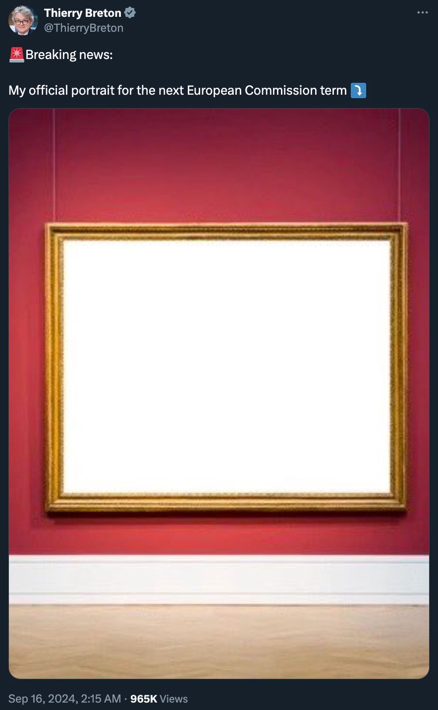 A framed empty white canvas on a red wall with the caption, "My official portrait for the next European Commission term."