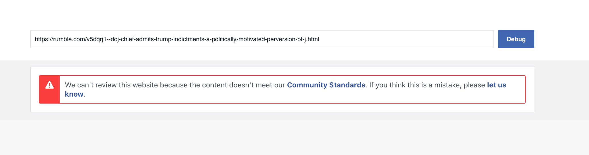 Alert message stating that the website can't be reviewed because the content doesn't meet the Community Standards, with a link for users to notify if it is a mistake.