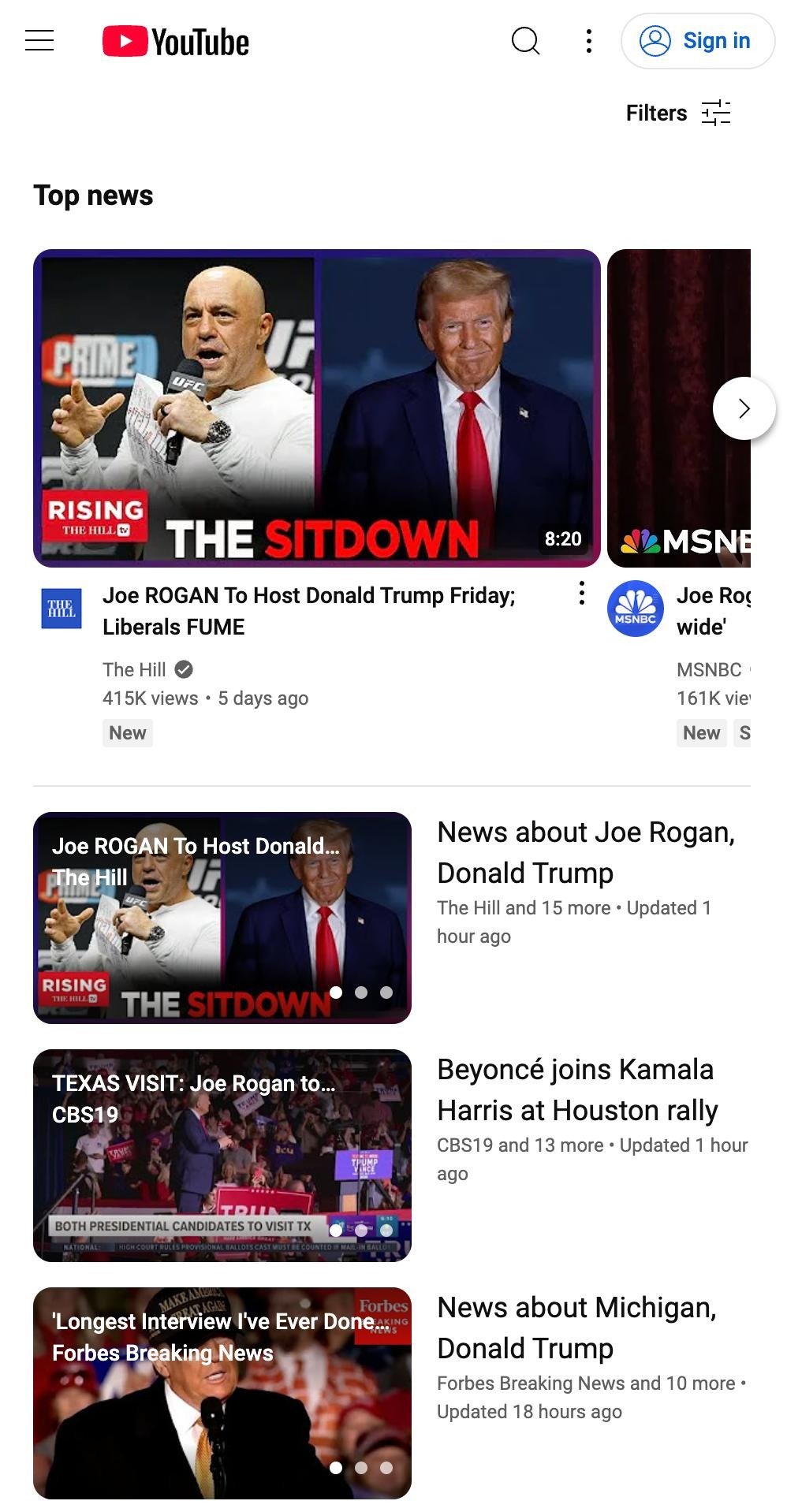 Screenshot of YouTube's "Top news" section featuring videos and headlines related to Joe Rogan and Donald Trump.