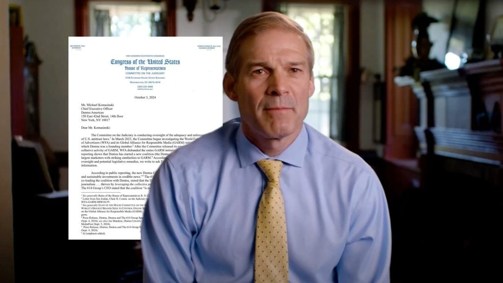 Jim Jordan in a blue shirt and yellow tie is sitting indoors with a document in the background labeled "Congress of the United States House of Representatives."