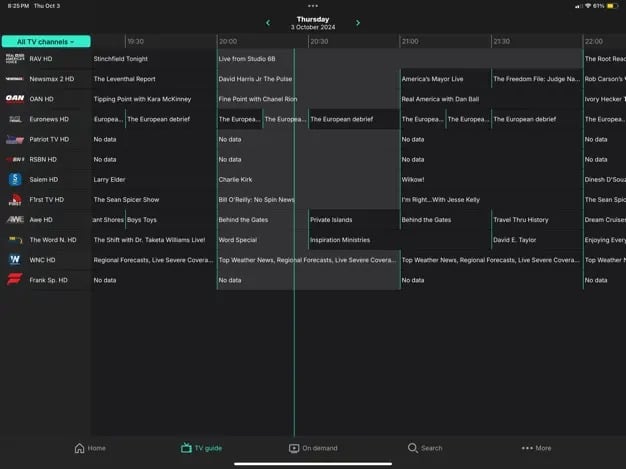 TV guide displayed on a screen showing various channels and scheduled programs for Thursday, October 3, 2024.