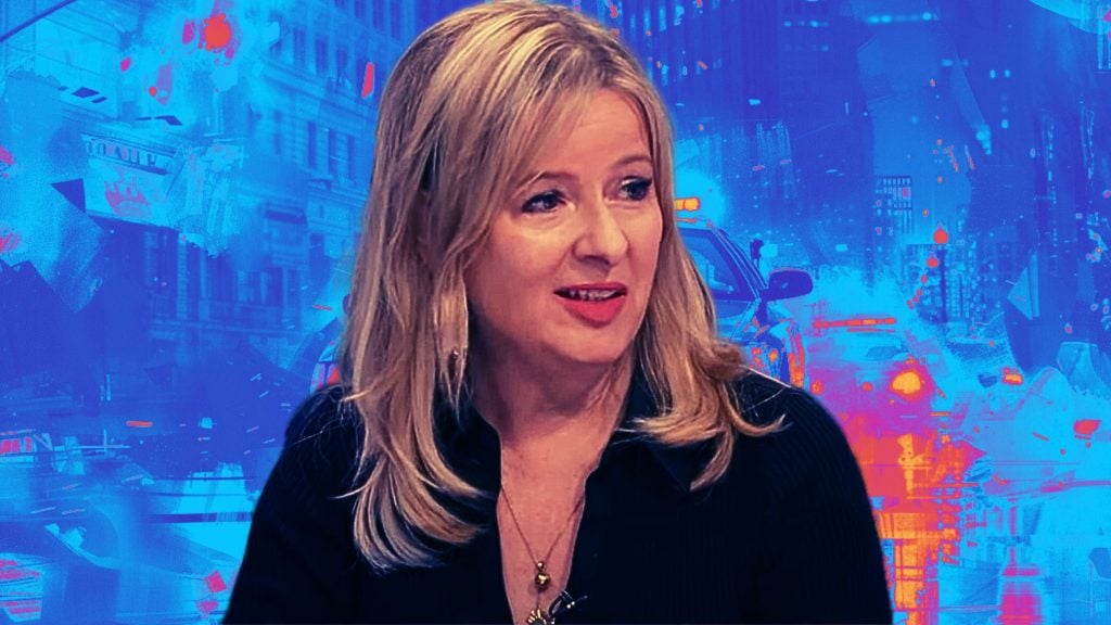 Alison Pearson with blonde hair is speaking, set against a vivid blue and orange urban background.