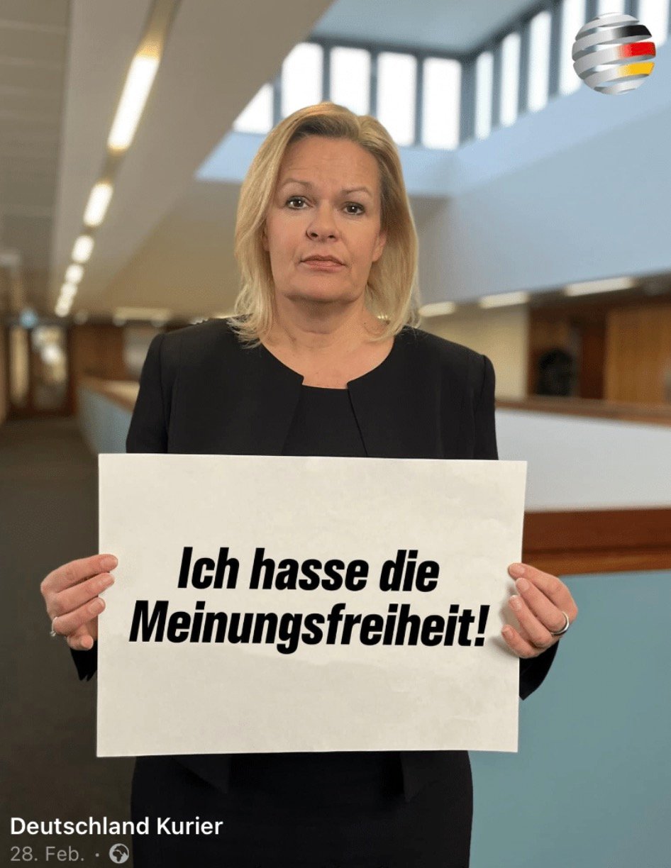 Faeser holding a sign that reads "Ich hasse die Meinungsfreiheit!" in a hallway.