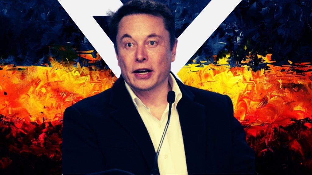 Elon Musk speaking at a microphone, wearing a dark blazer over a white shirt. The background features an abstract design with dark blue, orange, and red hues, resembling a fiery texture. A bold "X" shape is visible behind Musk, creating a dramatic contrast.