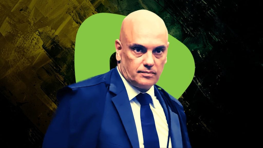 Moraes in a suit and tie against an abstract background with green and dark colors.