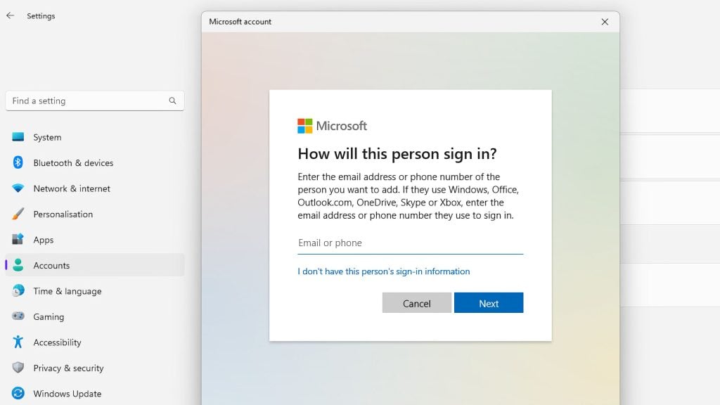 A computer screen displaying the Microsoft account sign-in window, requesting an email address or phone number for sign-in, alongside a settings menu with options like System, Network & internet, and Accounts.