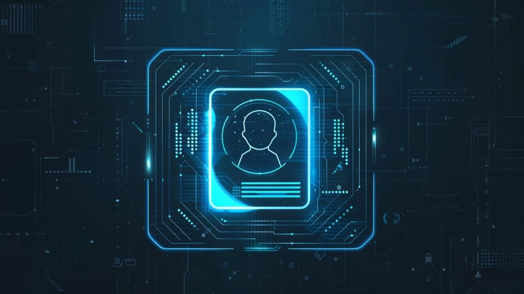 Glowing blue digital interface with a central user profile icon surrounded by circuit-like patterns on a dark futuristic background.