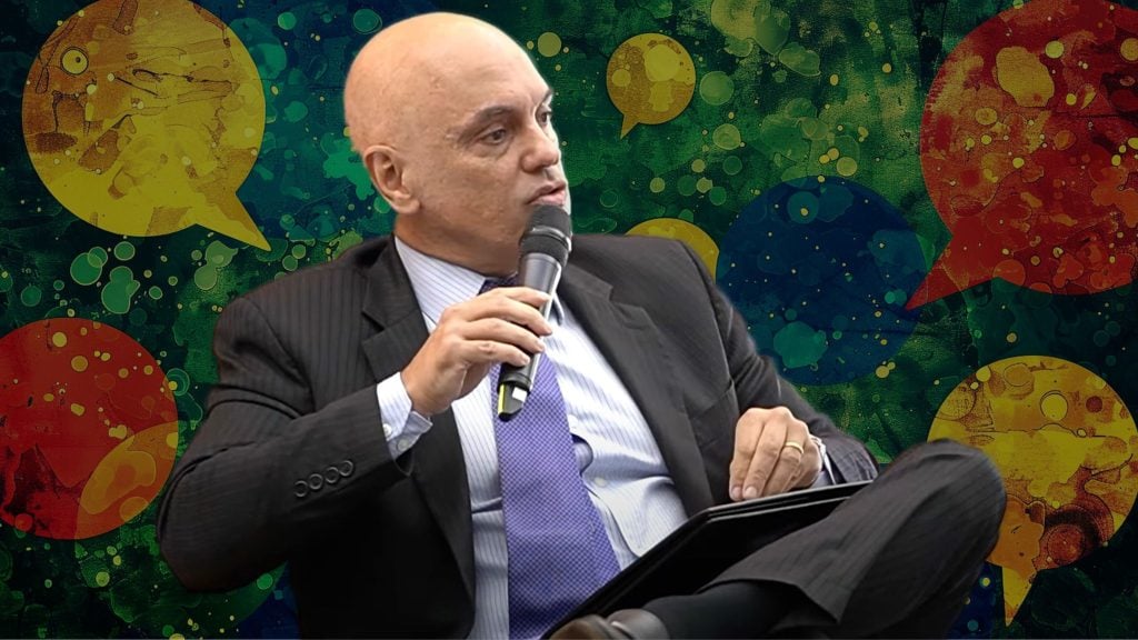 Moraes in a dark pinstripe suit and purple tie holding a microphone, sitting with one leg crossed, against a colorful background with speech bubbles and splatter patterns.