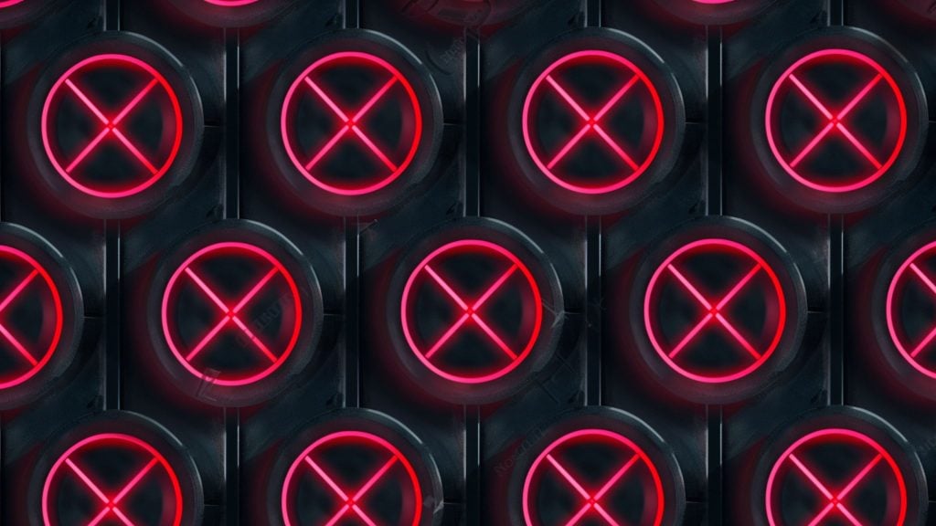 Close-up pattern of black circular valves with glowing red X-shaped neon lights arranged in rows.