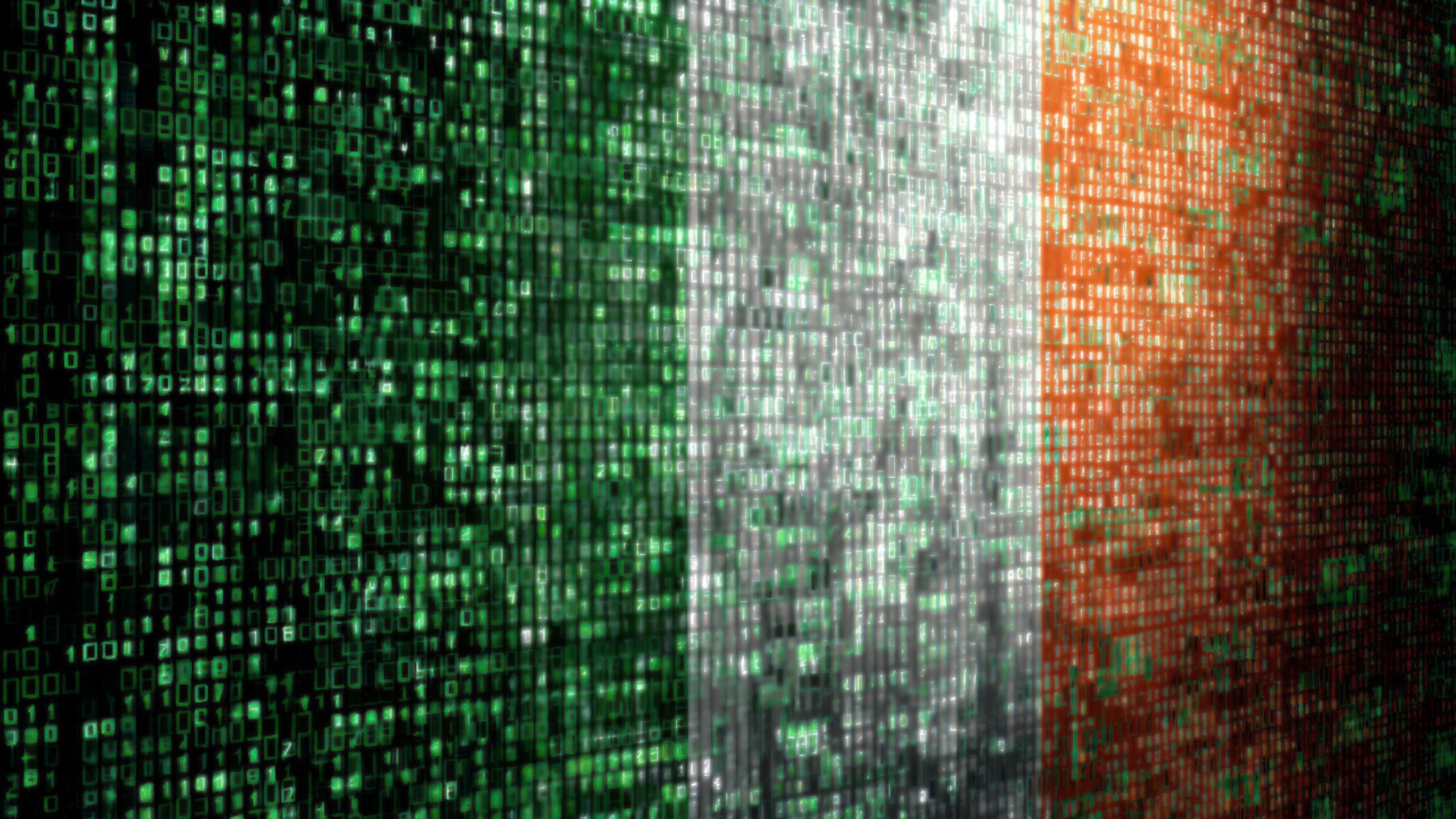 Digital matrix of green, white, and orange binary code forming the colors of the Irish flag in vertical stripes.