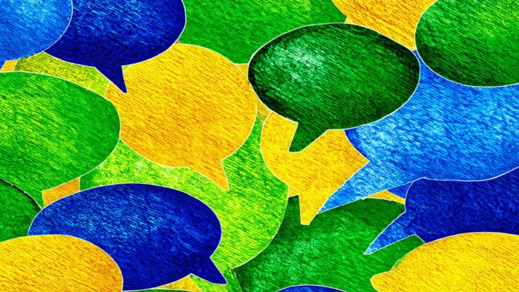 Colorful overlapping speech bubbles in blue, green, and yellow with a textured, crayon-like appearance
