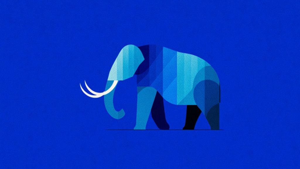 Geometric stylized elephant in layered shades of blue, walking left on a solid blue background with white curved tusks.
