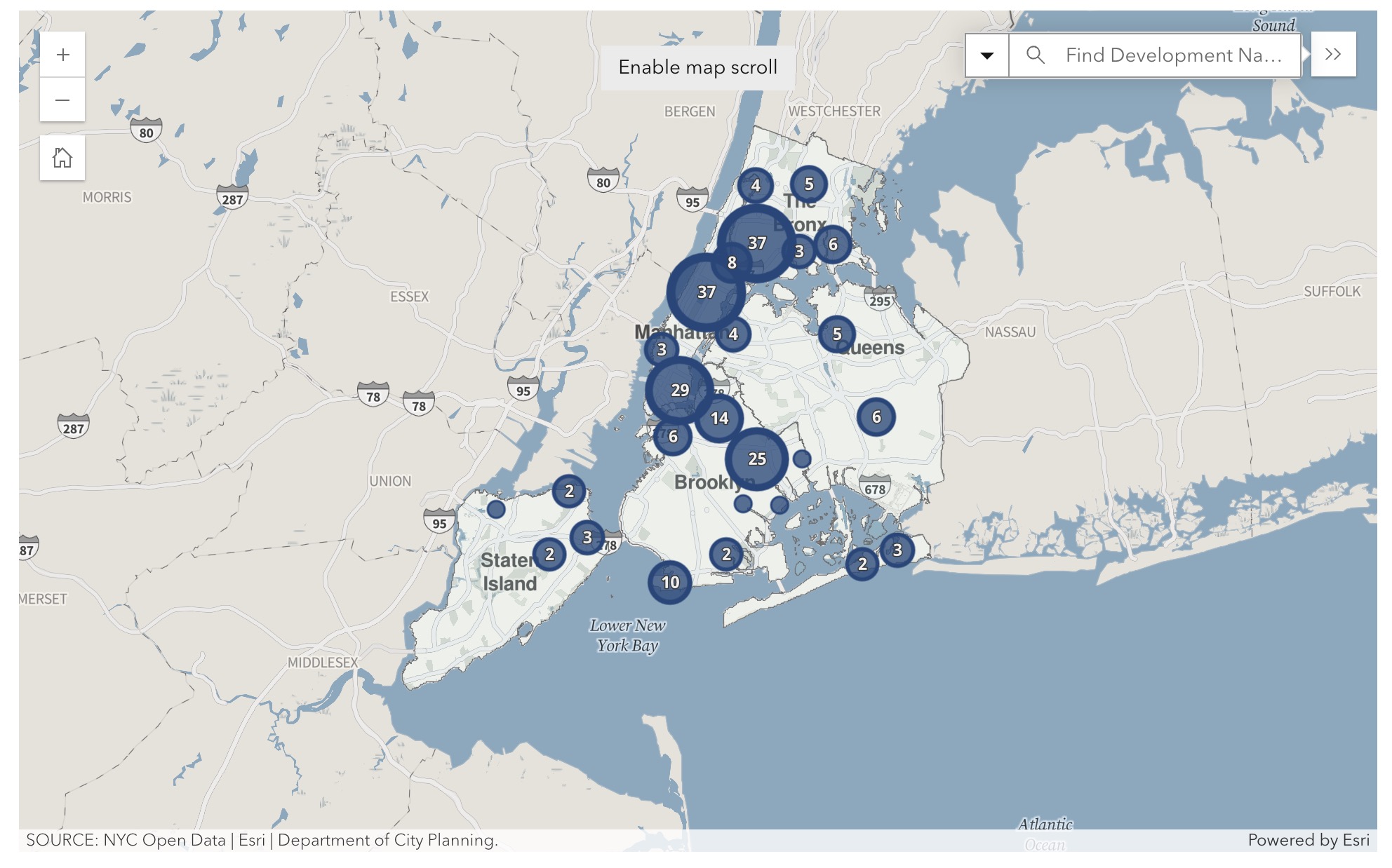 Muted street map of New York City and surrounding areas showing clustered dark-blue circular markers of varying sizes with white numbers (counts) concentrated over Manhattan, Brooklyn, Queens, Staten Island and nearby Long Island, with borough labels, highways and water labeled (Lower New York Bay), a search box at top right, zoom controls at top left, and a source credit at the bottom.