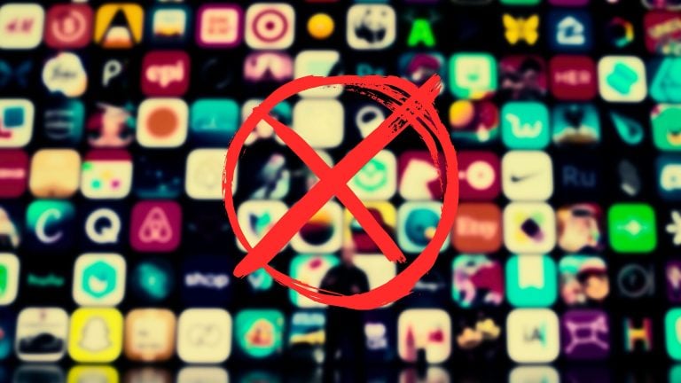 Large red hand-painted circle with an X over a blurred grid of colorful app icons, conveying apps being blocked or rejected.