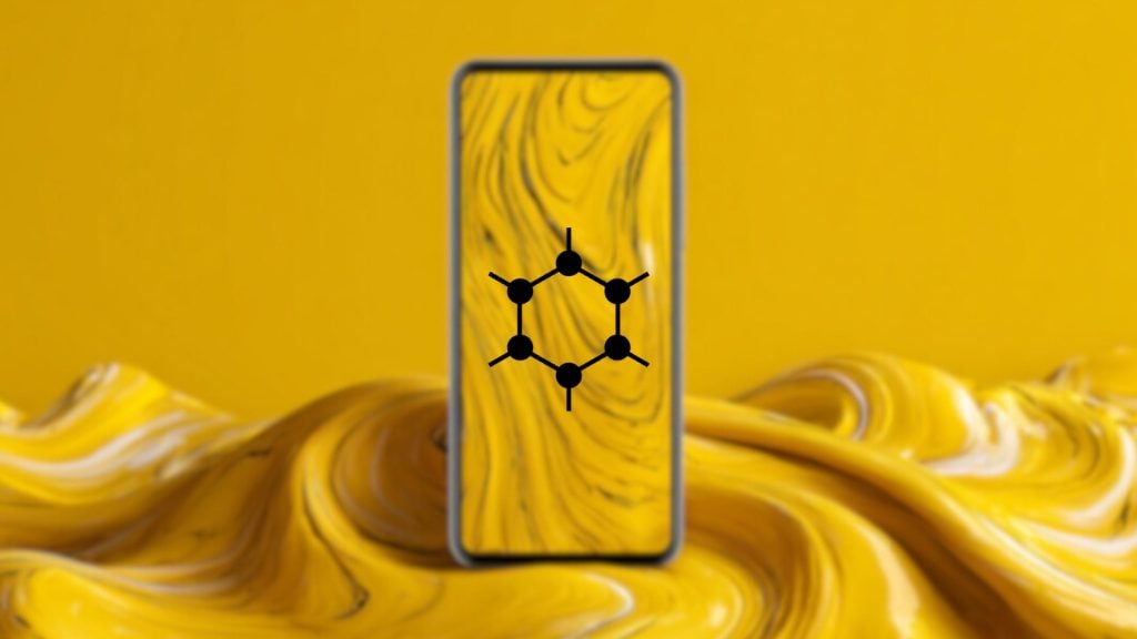 Centered smartphone with a yellow marbled screen displaying a black benzene-style hexagonal molecular ring, set against swirling yellow paint-like waves.