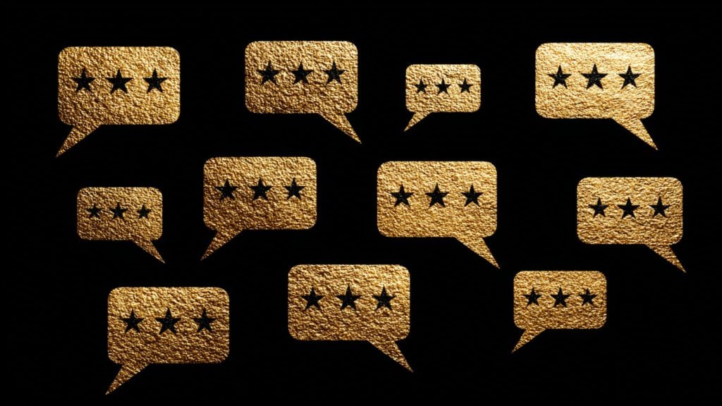 Multiple gold-textured speech bubbles on a black background, each containing three black stars to represent three-star reviews.