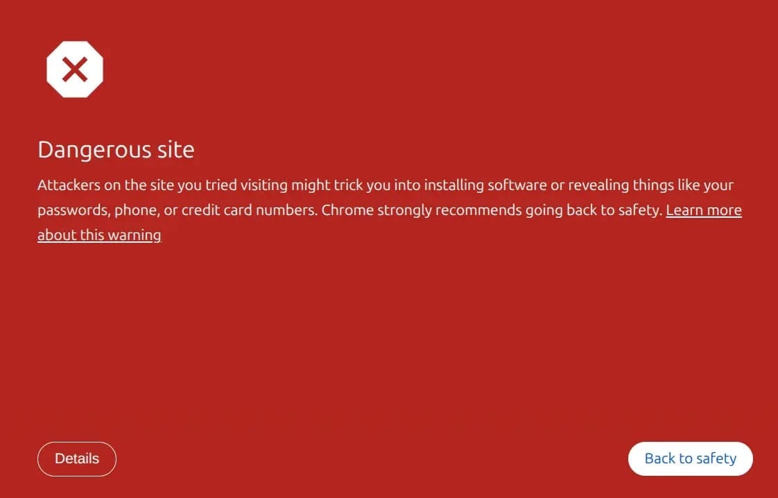 Browser warning page with a red background showing a white octagon with an X and the heading Dangerous site, explanatory text saying attackers might trick you into installing software or revealing passwords, phone, or credit card numbers, and two buttons labeled Details and Back to safety.