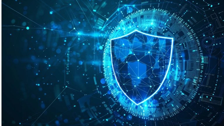 Glowing blue shield made of interconnected nodes and polygonal lines centered over concentric digital circuitry and streaming network lines on a dark blue background, symbolizing cybersecurity and data protection.