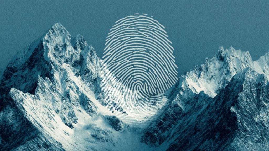 Snow-covered jagged mountain peaks under a muted teal sky with a large translucent white fingerprint pattern centered above and blending into the central valley.