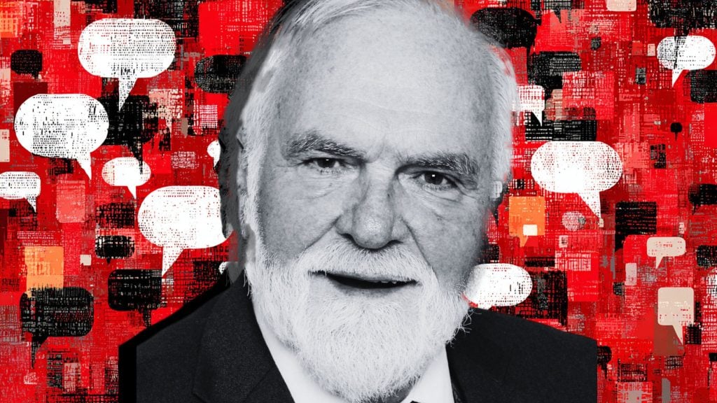 Close-up portrait of Neufeld with white beard and suit against a red background filled with stylized speech bubbles.