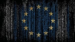 European Union flag formed from vertical code-like text stripes, showing twelve gold stars in a circle on blue