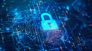 Glowing blue padlock with a fingerprint overlay on a circuit-board background, representing biometric cybersecurity.