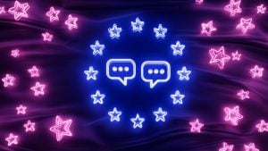 Neon blue speech bubbles surrounded by a ring of blue neon stars on a dark purple background with scattered pink neon stars