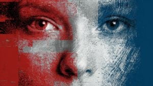 Close-up of a face split vertically into red left and blue right halves with textured, grainy stencil effect.