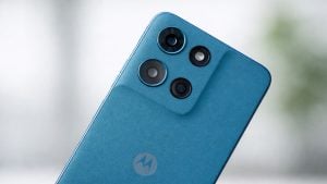 Blue textured Motorola phone back with raised square camera module holding three lenses, an LED flash and Motorola logo.