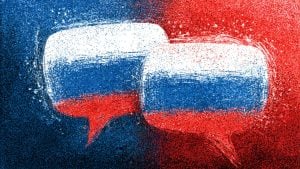 Two overlapping speech bubbles painted in textured red, white, and blue, set against a split blue-and-red speckled background.