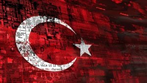 Red Turkish flag with white crescent and star overlaid with glitchy digital code and circuitry patterns.