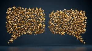 Two clusters of floating metallic gold stars forming mirror speech-bubble shapes against a dark blue background